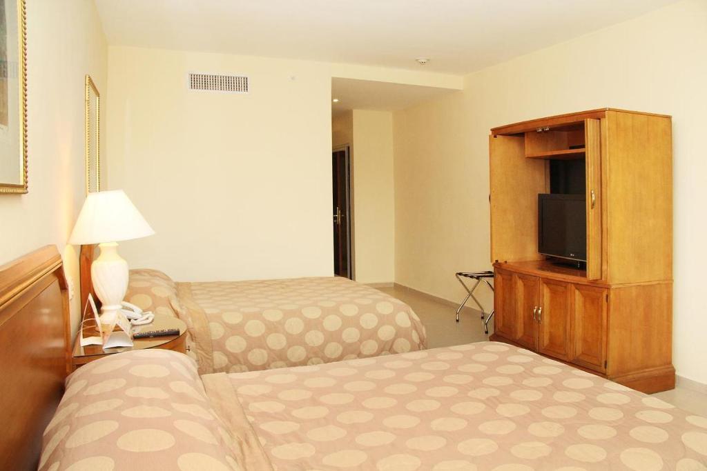 Ramada By Wyndham Princess Santo Domingo Habitación foto